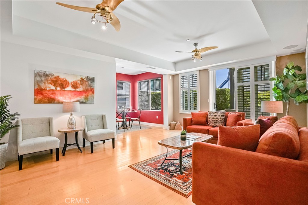 150 The Promenade North, Unit 202 Long Beach, CA 90802 - Photo 5 of 59 a living room with furniture a rug and a large window