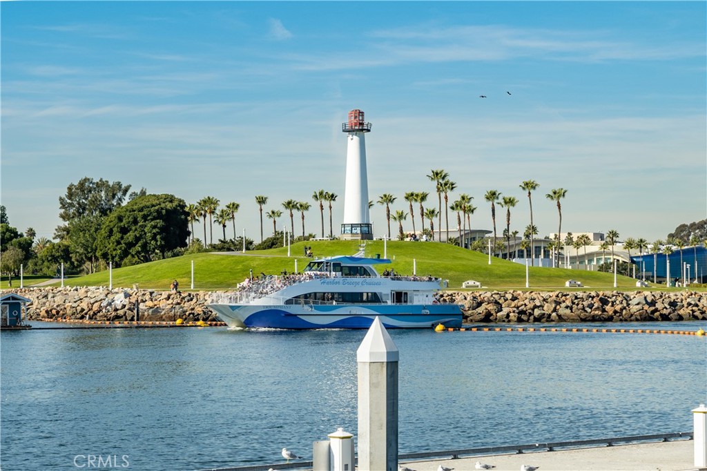 150 The Promenade North, Unit 202 Long Beach, CA 90802 - Photo 55 of 59 a view of a lake with a big yard