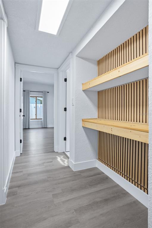 1231 Sidcup Road Maitland, FL 32751 - Photo 13 of 39 a view of a hallway with wooden floor and windows