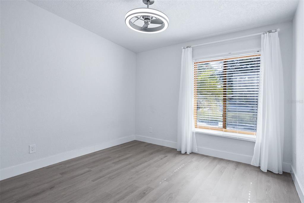 1231 Sidcup Road Maitland, FL 32751 - Photo 14 of 39 an empty room with a window