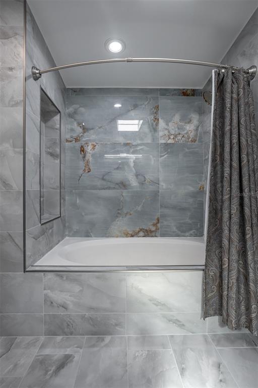 1231 Sidcup Road Maitland, FL 32751 - Photo 18 of 39 a bathroom with a shower