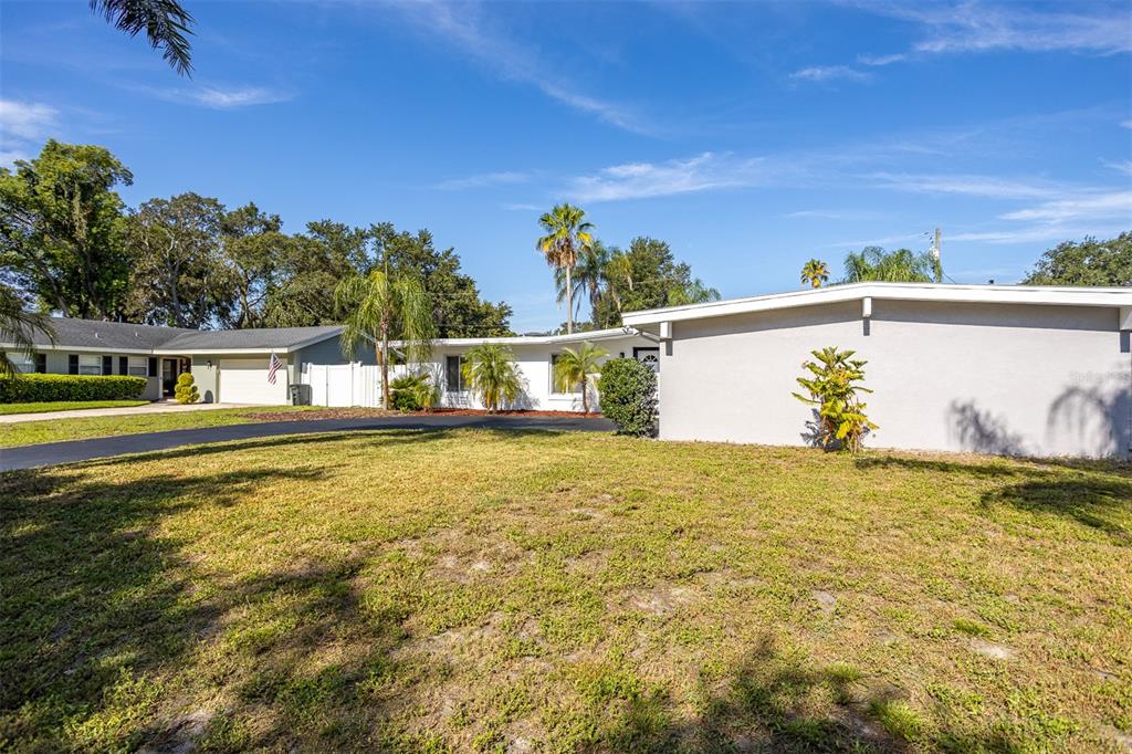 1231 Sidcup Road Maitland, FL 32751 - Photo 37 of 39 a house view with swimming pool in front of it