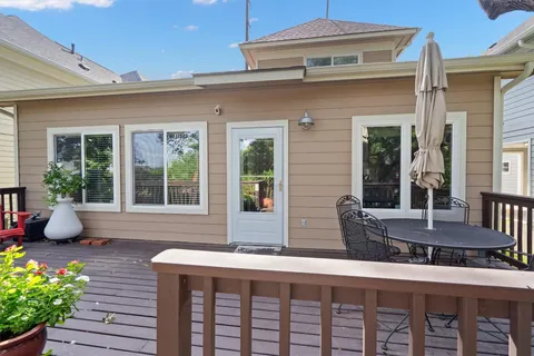 a front view of house with outdoor seating