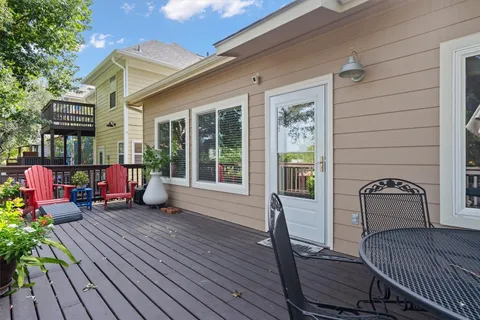a view of a house with sitting area and furniture
