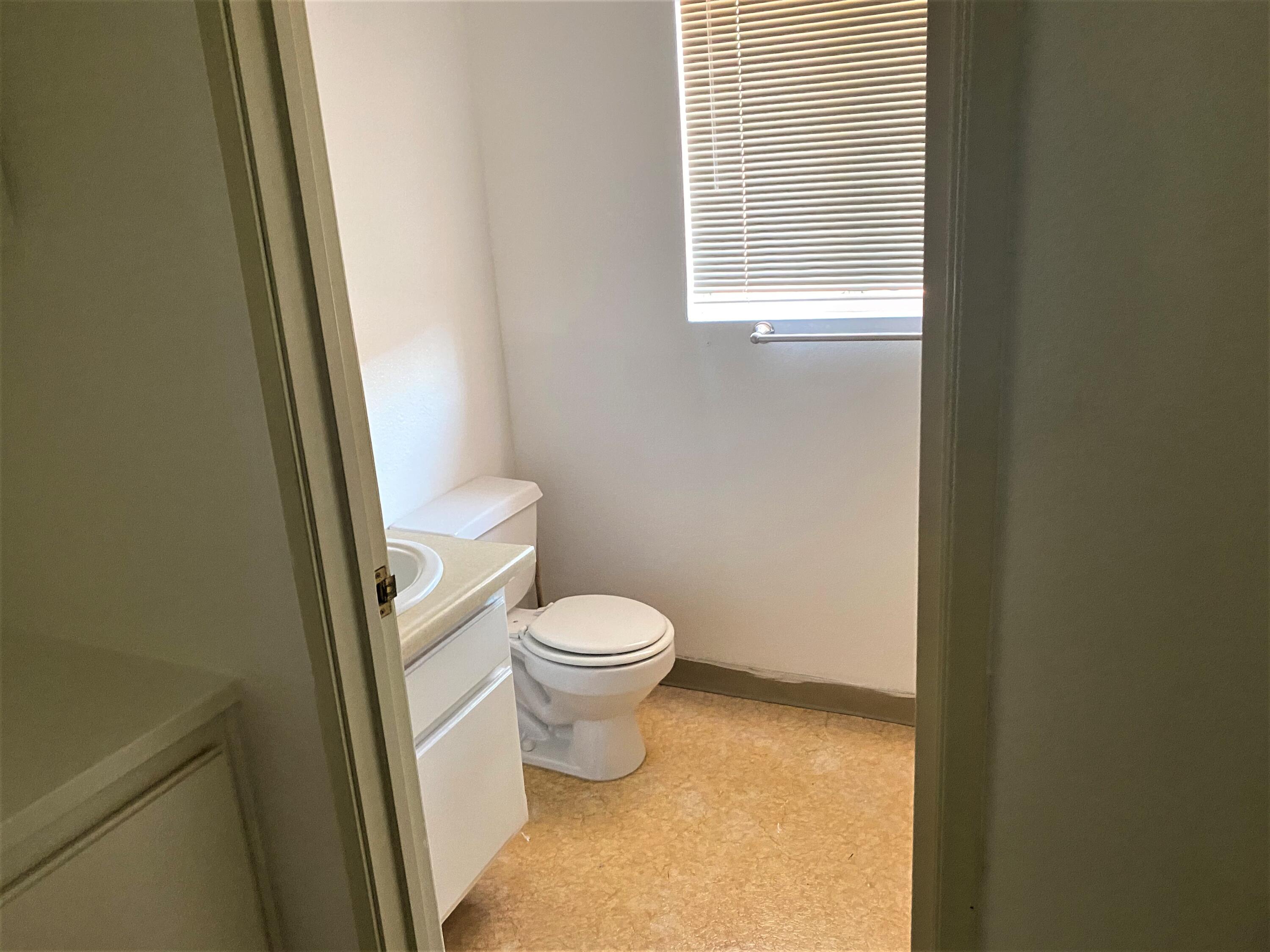 517 West Ward Avenue Ridgecrest, CA 93555 - Photo 12 of 18 a bathroom with a toilet and a sink