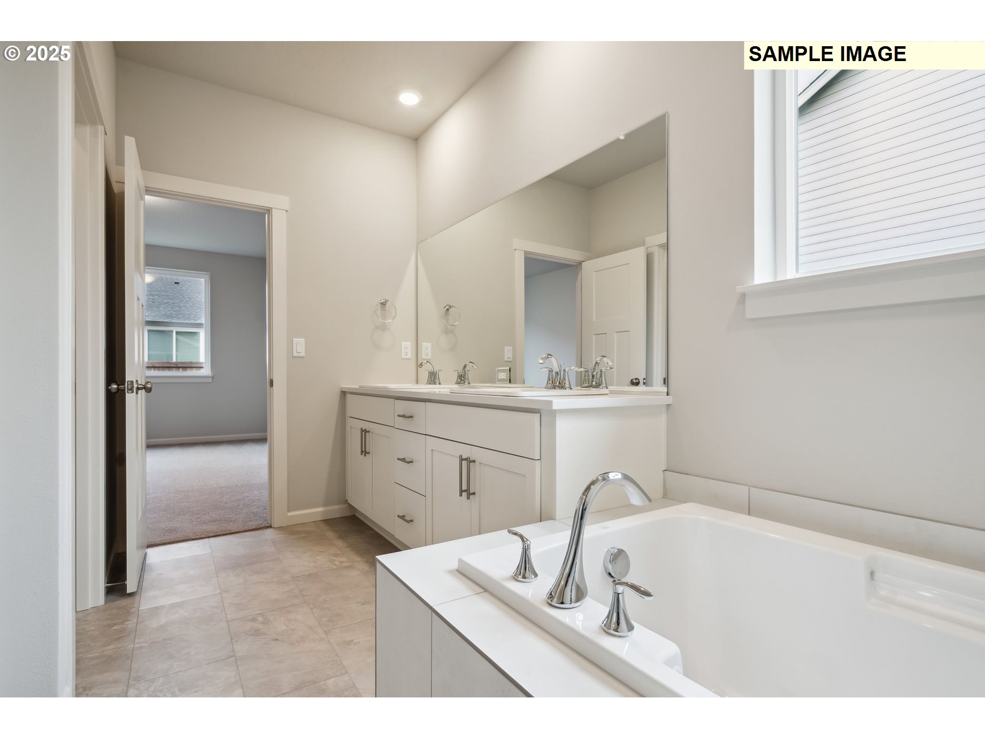 12177 Southwest Champlin Lane Beaverton, OR 97007 - Photo 11 of 22 a bathroom with a sink vanity granite tub and a mirror