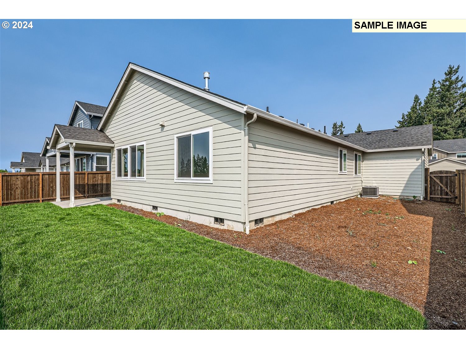 12177 Southwest Champlin Lane Beaverton, OR 97007 - Photo 14 of 22 a view of a backyard of the house