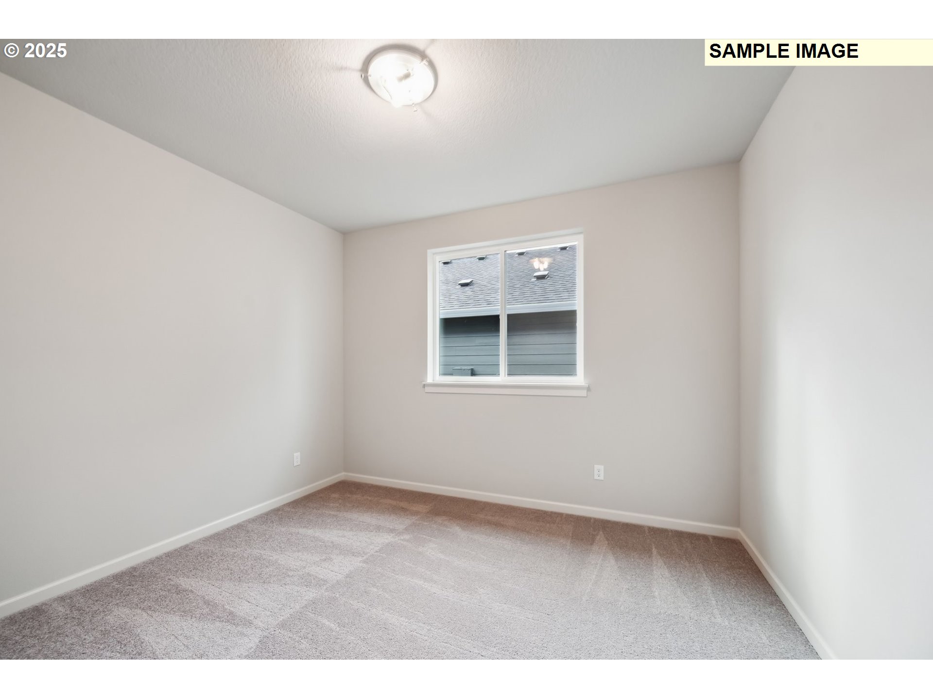 12177 Southwest Champlin Lane Beaverton, OR 97007 - Photo 9 of 22 a view of an empty room