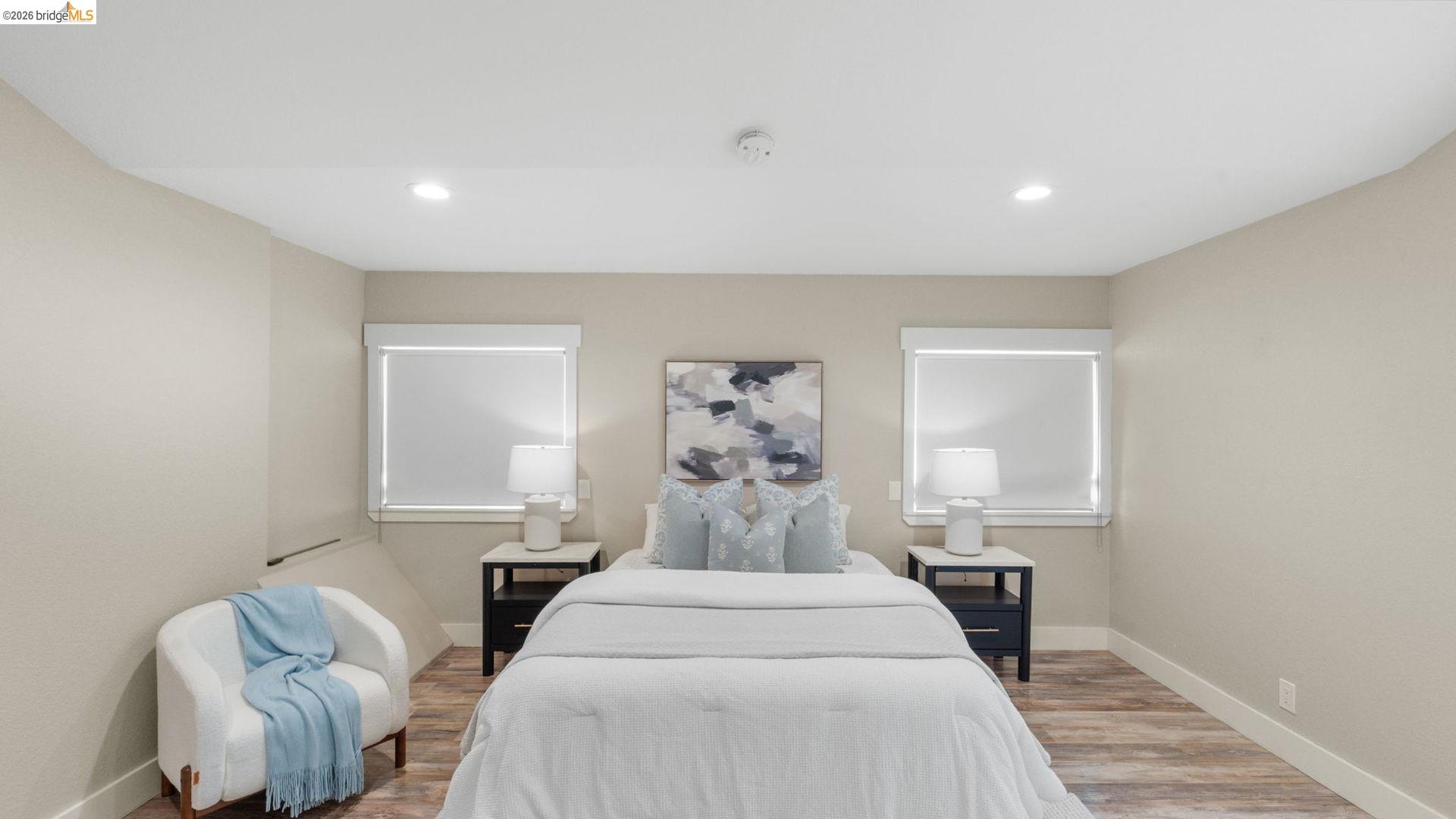 700 Brownstone Road Oakley, CA 94561 - Photo 30 of 58 a bedroom with a bed and a painting