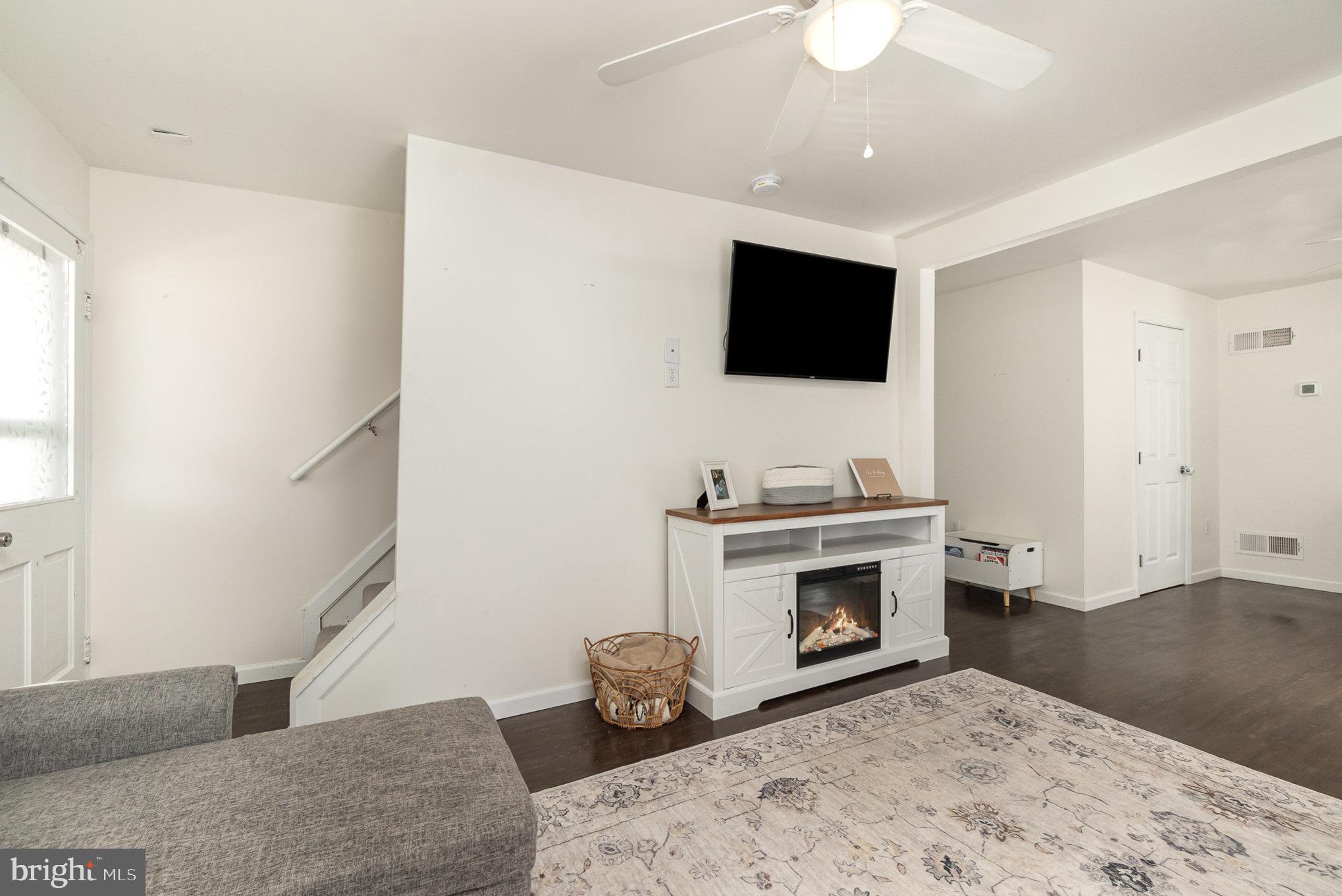15 Mount Street Rising Sun, MD 21911 - Photo 11 of 30 a living room with furniture and a fireplace