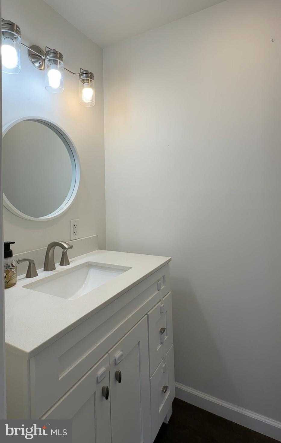 15 Mount Street Rising Sun, MD 21911 - Photo 14 of 30 a bathroom with a sink and a mirror