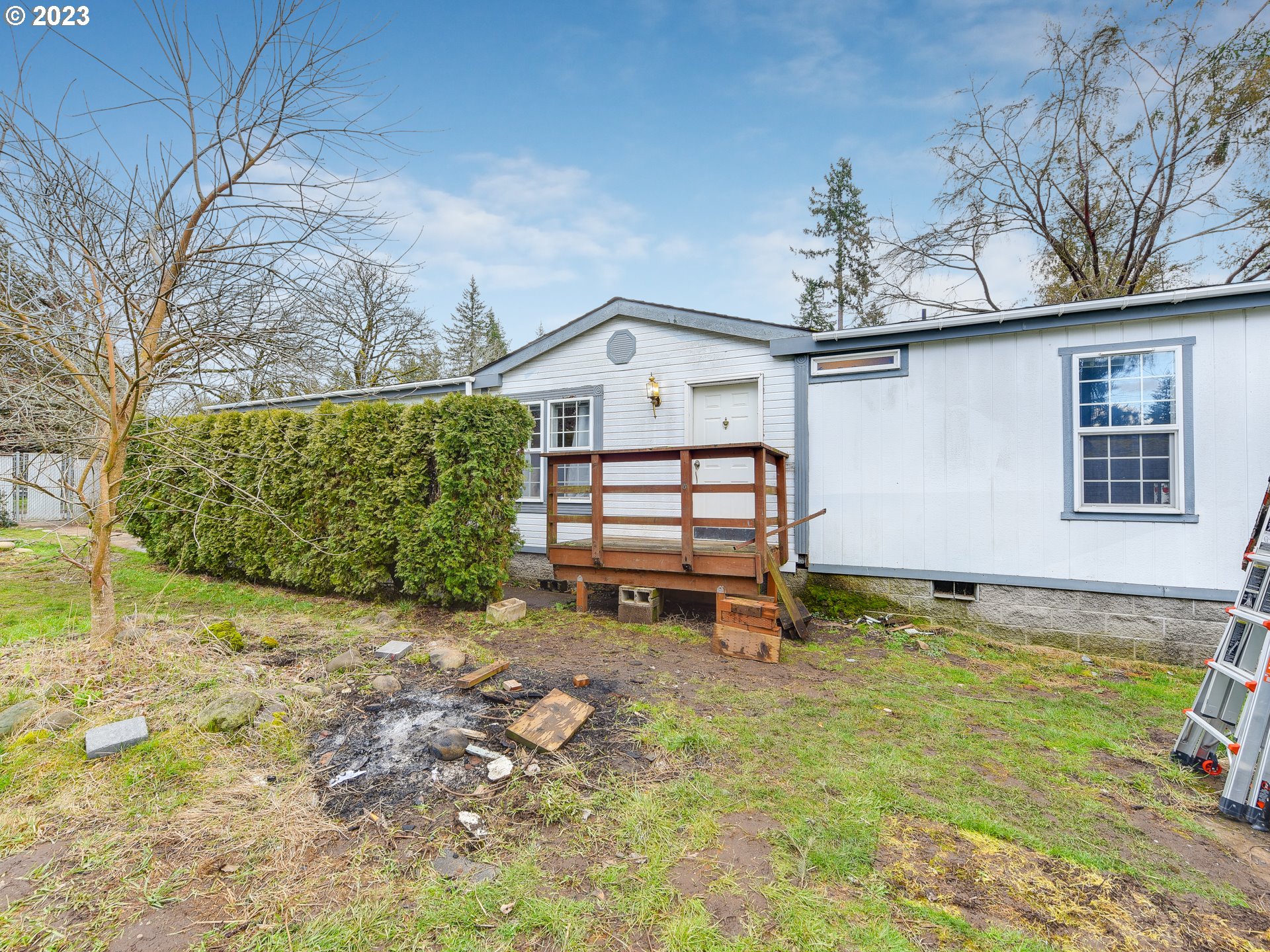 453 Southwest Hawthorn Road Estacada, OR 97023 - Photo 3 of 20 a view of a house with a yard