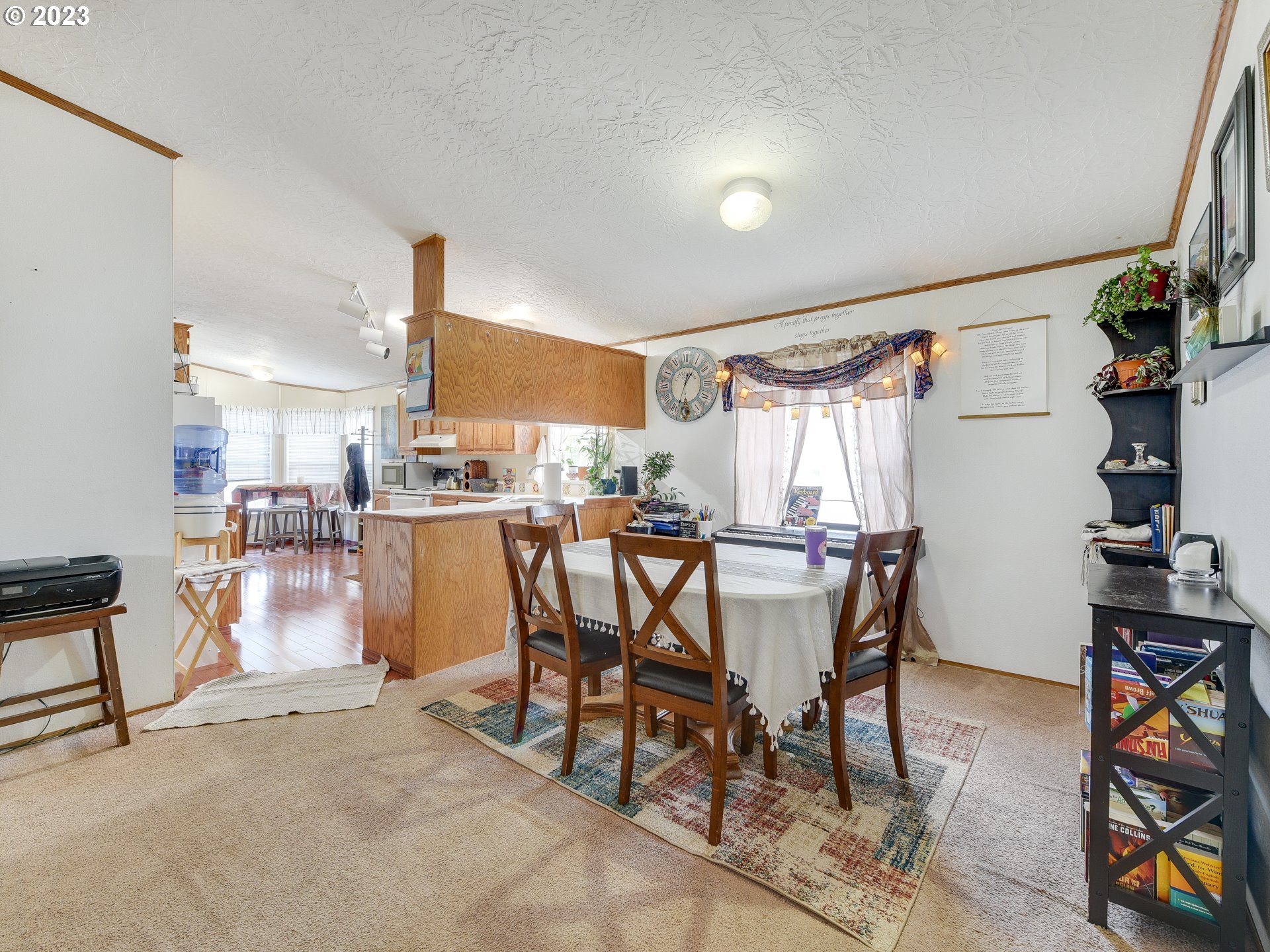 453 Southwest Hawthorn Road Estacada, OR 97023 - Photo 6 of 20 a dining room with furniture and wooden floor