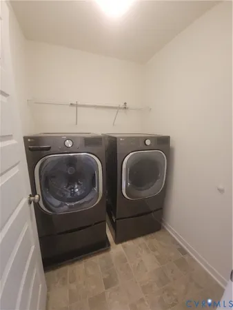 a bathroom with a toilet and a sink