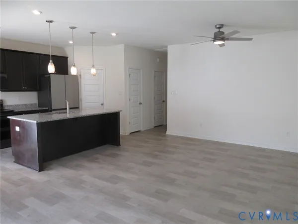 a view of a kitchen with a sink