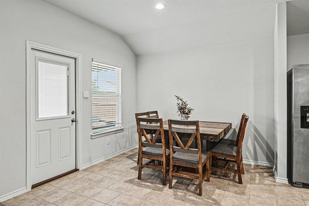 513 Bronze Circle West Springtown, TX 76082 - Photo 6 of 25 Dining area featuring neutral wall tones, recessed lighting, and tile flooring