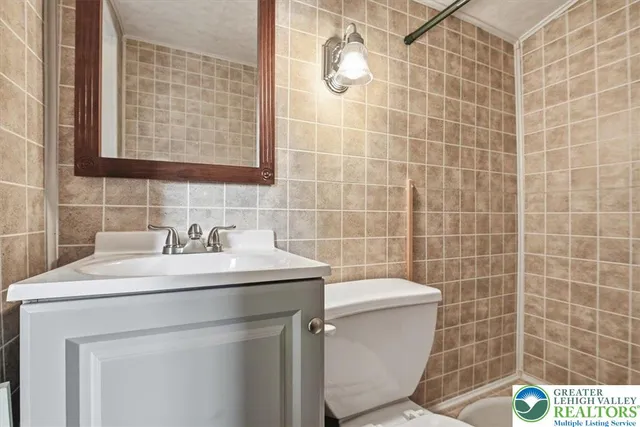 a view of balcony with wooden floor and fence