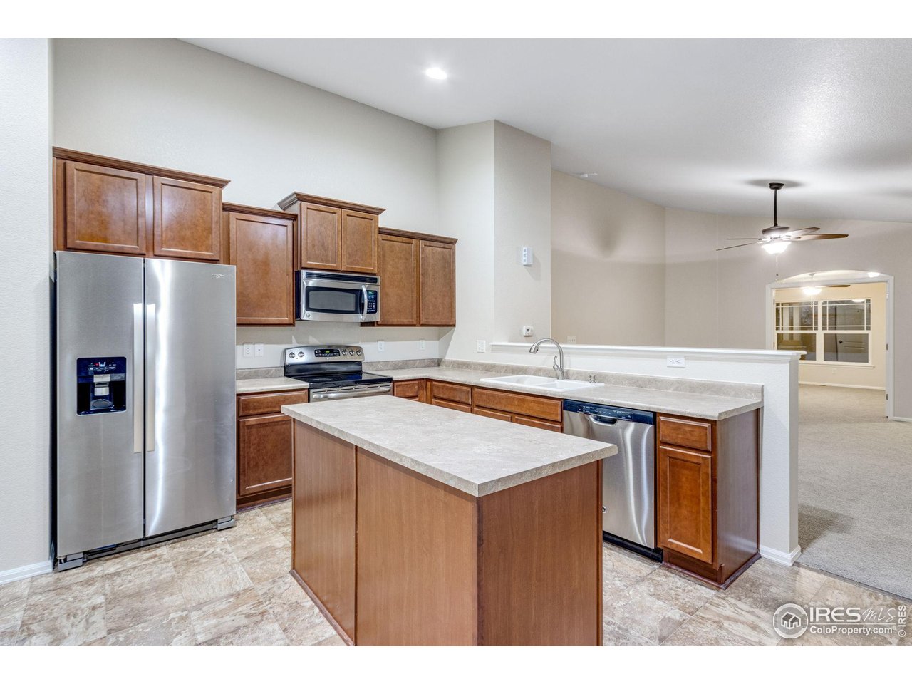 1554 Benfleet Court Windsor, CO 80550 - Photo 12 of 26 Open to Living Room