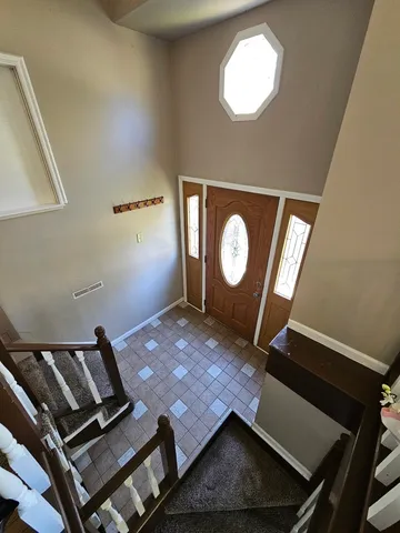 a view of a backyard of the house