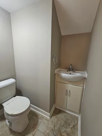 a bathroom with a sink and a toilet