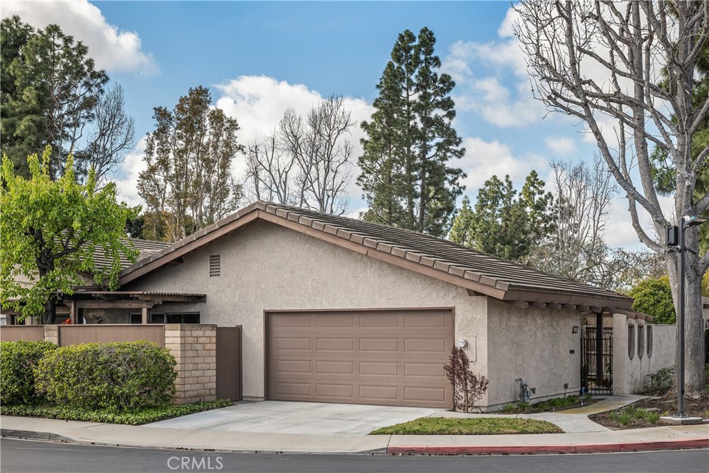 a house with trees in the background