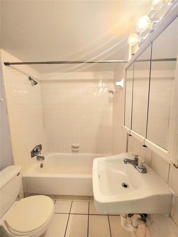 914 Lake Destiny Road, Unit G Altamonte Springs, FL 32714 - Photo 11 of 30 a bathroom with a sink and a mirror