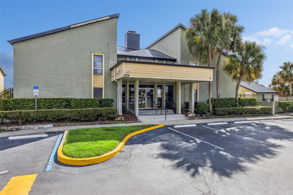 914 Lake Destiny Road, Unit G Altamonte Springs, FL 32714 - Photo 20 of 30 a view of a house with swimming pool and a yard