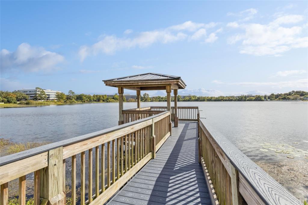 914 Lake Destiny Road, Unit G Altamonte Springs, FL 32714 - Photo 22 of 30 a view of a lake and a city skyline