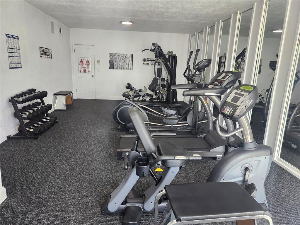 914 Lake Destiny Road, Unit G Altamonte Springs, FL 32714 - Photo 29 of 30 a view of a room with gym equipment