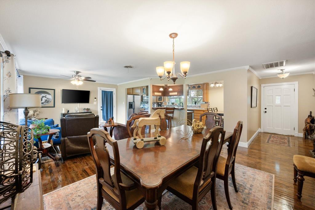 14036 Old Texaco Road Conroe, TX 77302 - Photo 10 of 40 a view of a dining room with furniture