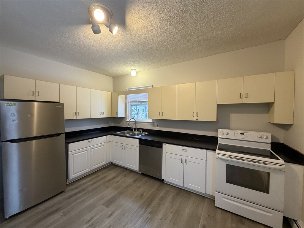 137 Midland Street, Unit 1 Lowell, MA 01851 - Photo 1 of 16