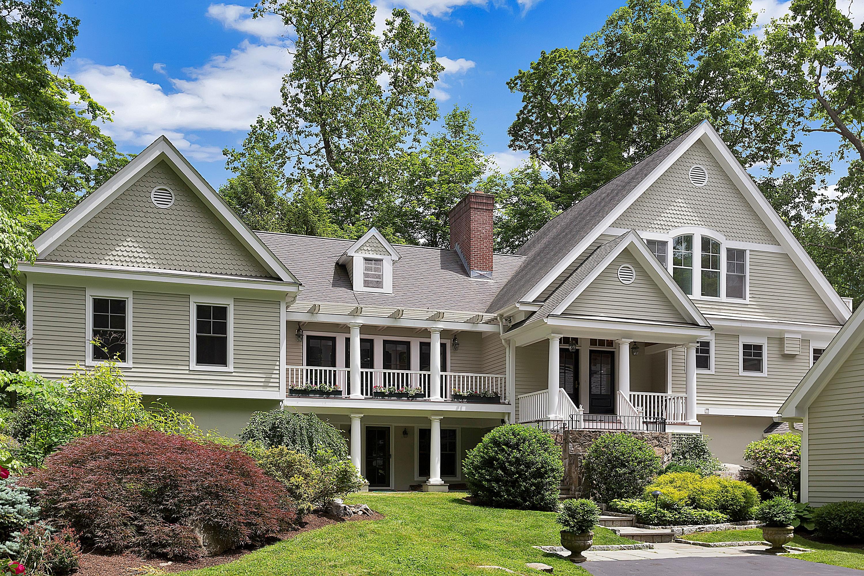 6 Wildcat Road Darien, CT 06820 - Photo 1 of 27 a front view of a house with a yard