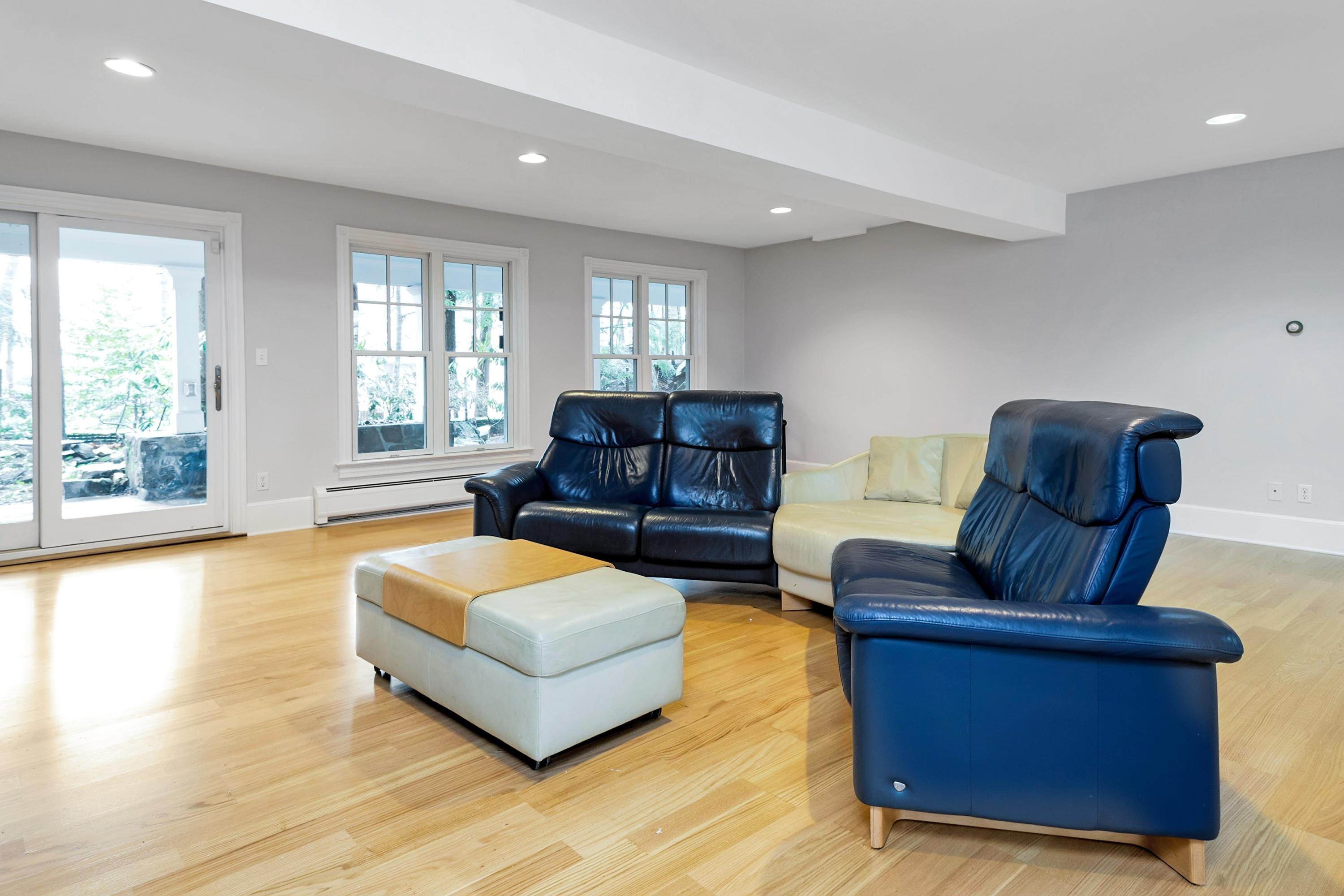 6 Wildcat Road Darien, CT 06820 - Photo 11 of 27 a living room with furniture and a large window