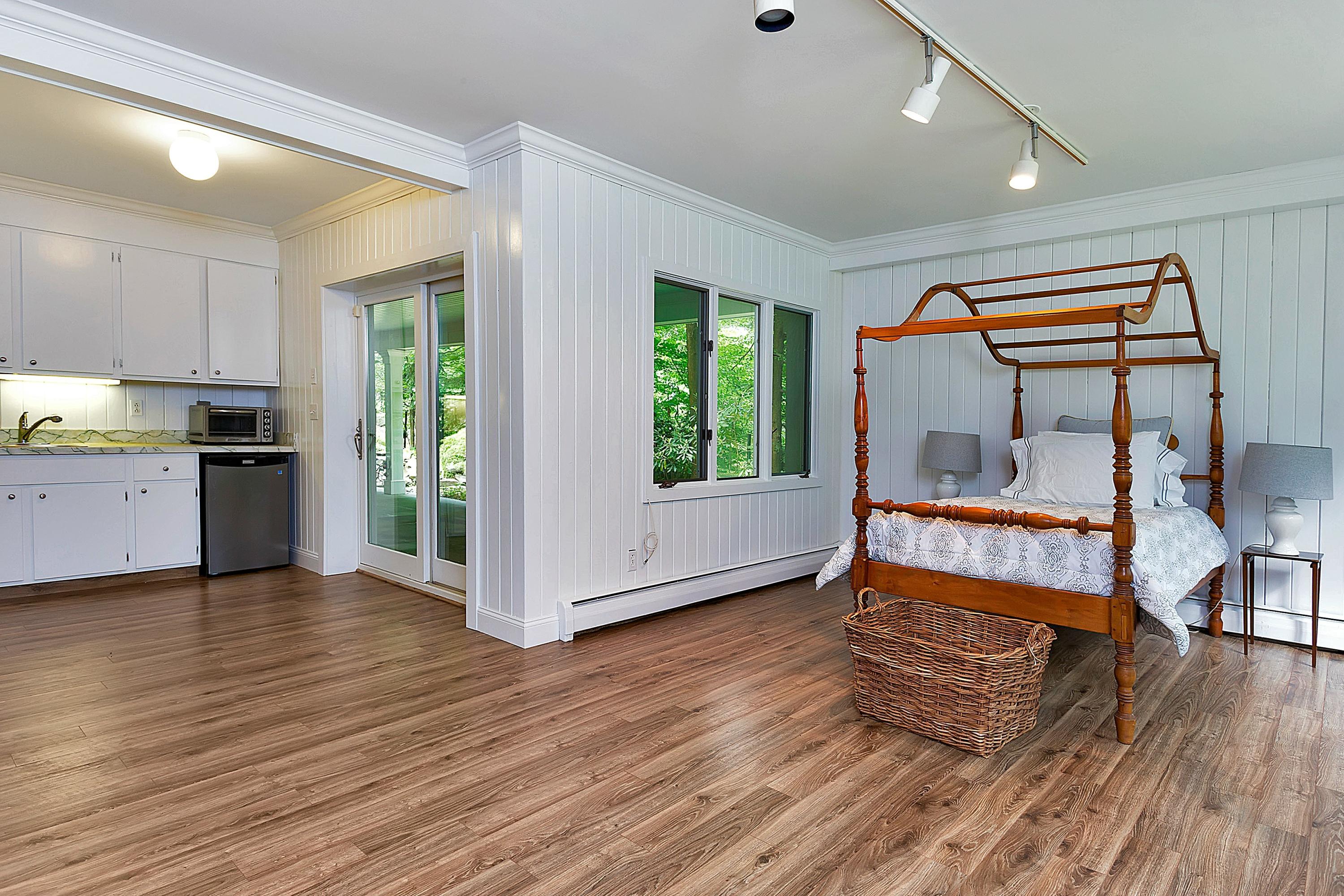 6 Wildcat Road Darien, CT 06820 - Photo 22 of 27 a view of kitchen with furniture and wooden floor