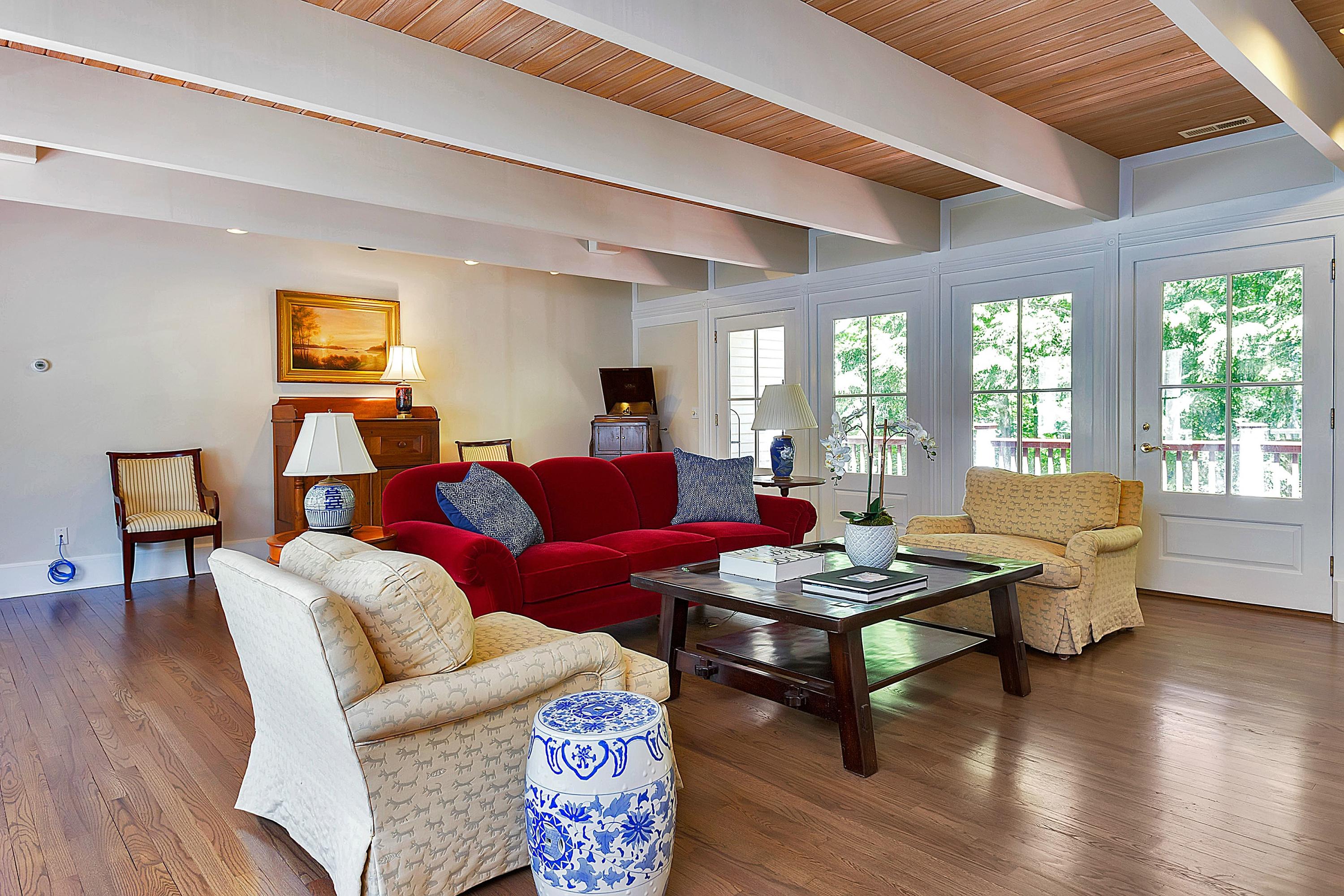 6 Wildcat Road Darien, CT 06820 - Photo 4 of 27 a living room with furniture and wooden floor