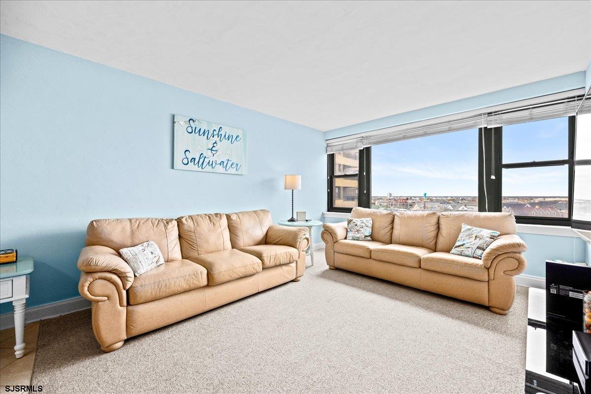 101 South Raleigh Avenue, Unit 619 Atlantic City, NJ 08401 - Photo 4 of 24 a living room with furniture and a large window