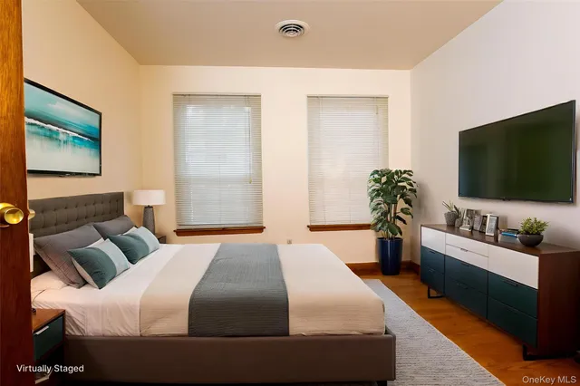 a bathroom with a sink a mirror and a shower curtain