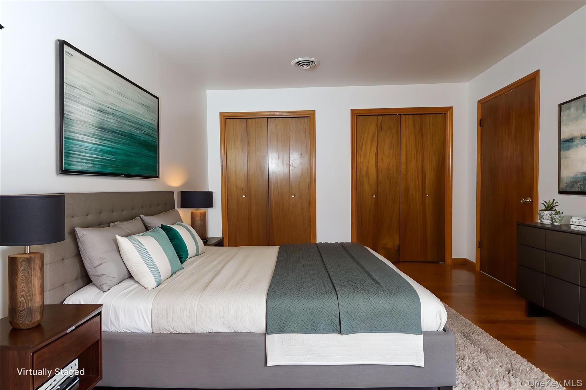 1306 Rosewood Court Highland Mills, NY 10930 - Photo 19 of 44 Bedroom with wood finished floors and two closets