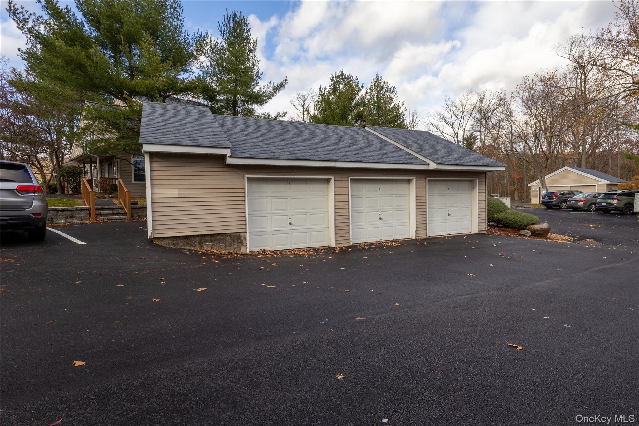1306 Rosewood Court Highland Mills, NY 10930 - Photo 26 of 44 a car parked in front of a house