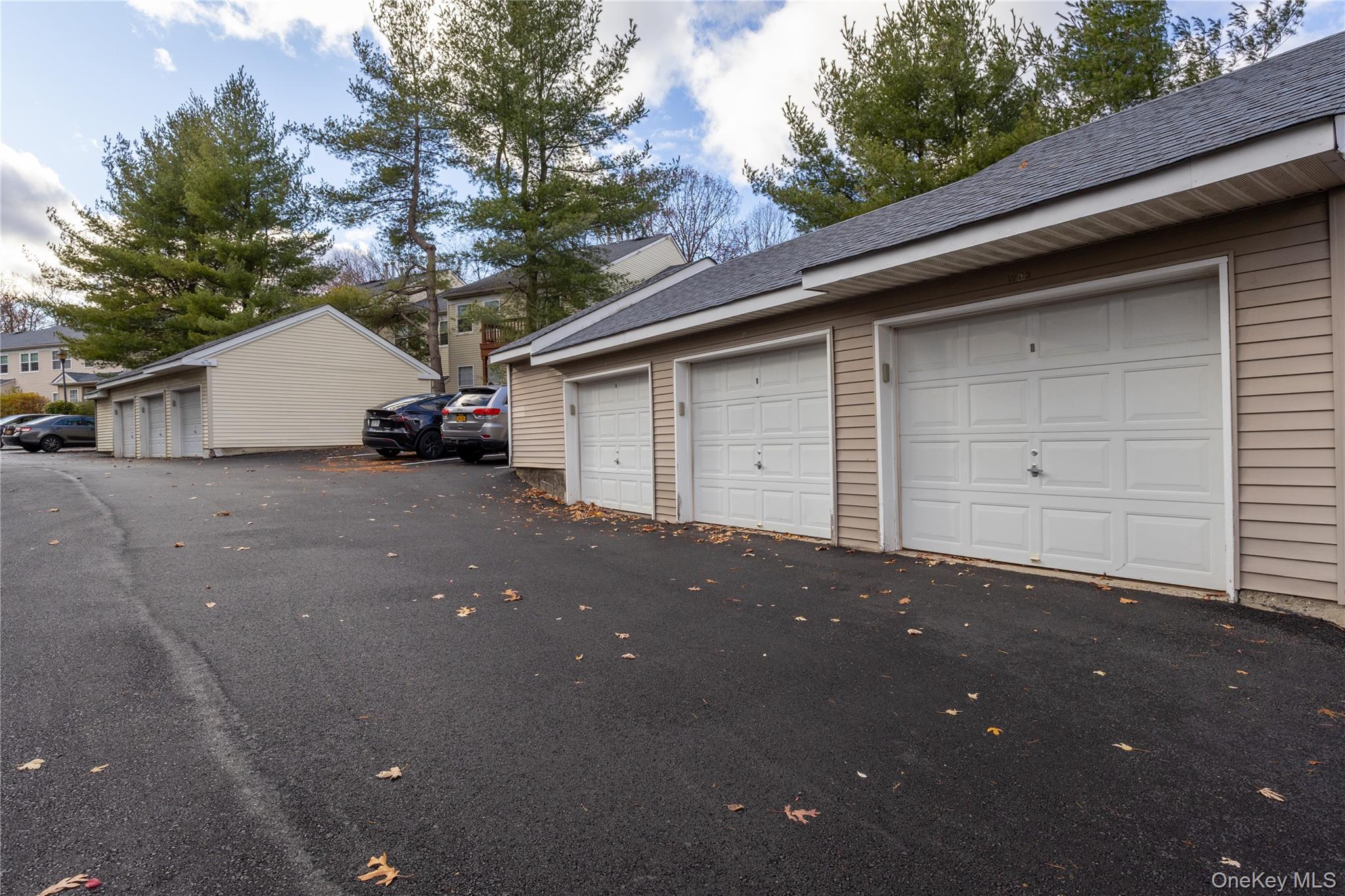 1306 Rosewood Court Highland Mills, NY 10930 - Photo 31 of 44 a view of a house with a garage