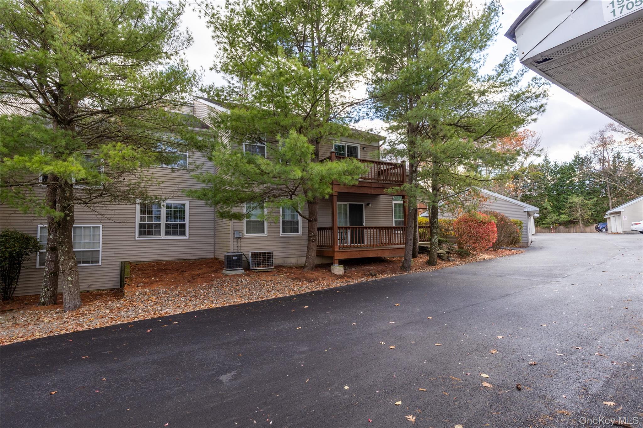 1306 Rosewood Court Highland Mills, NY 10930 - Photo 34 of 44 a view of a house with a yard and sitting area