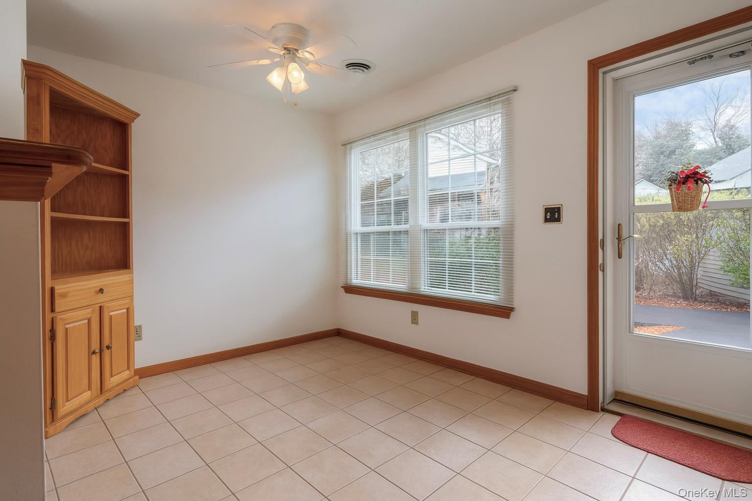 1306 Rosewood Court Highland Mills, NY 10930 - Photo 5 of 44 a view of an empty room with a window