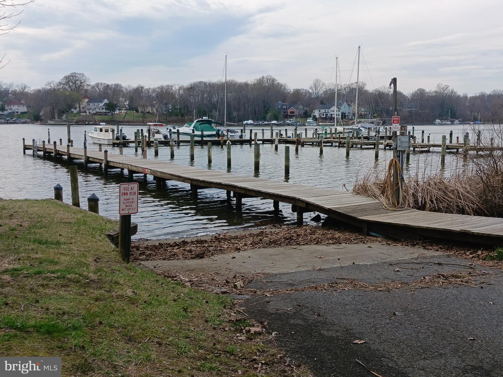 176 Southdown Road Edgewater, MD 21037 - Photo 5 of 13 a view of a lake with a mountain in the background