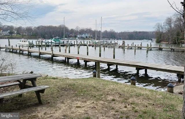 a view of a lake with sitting area