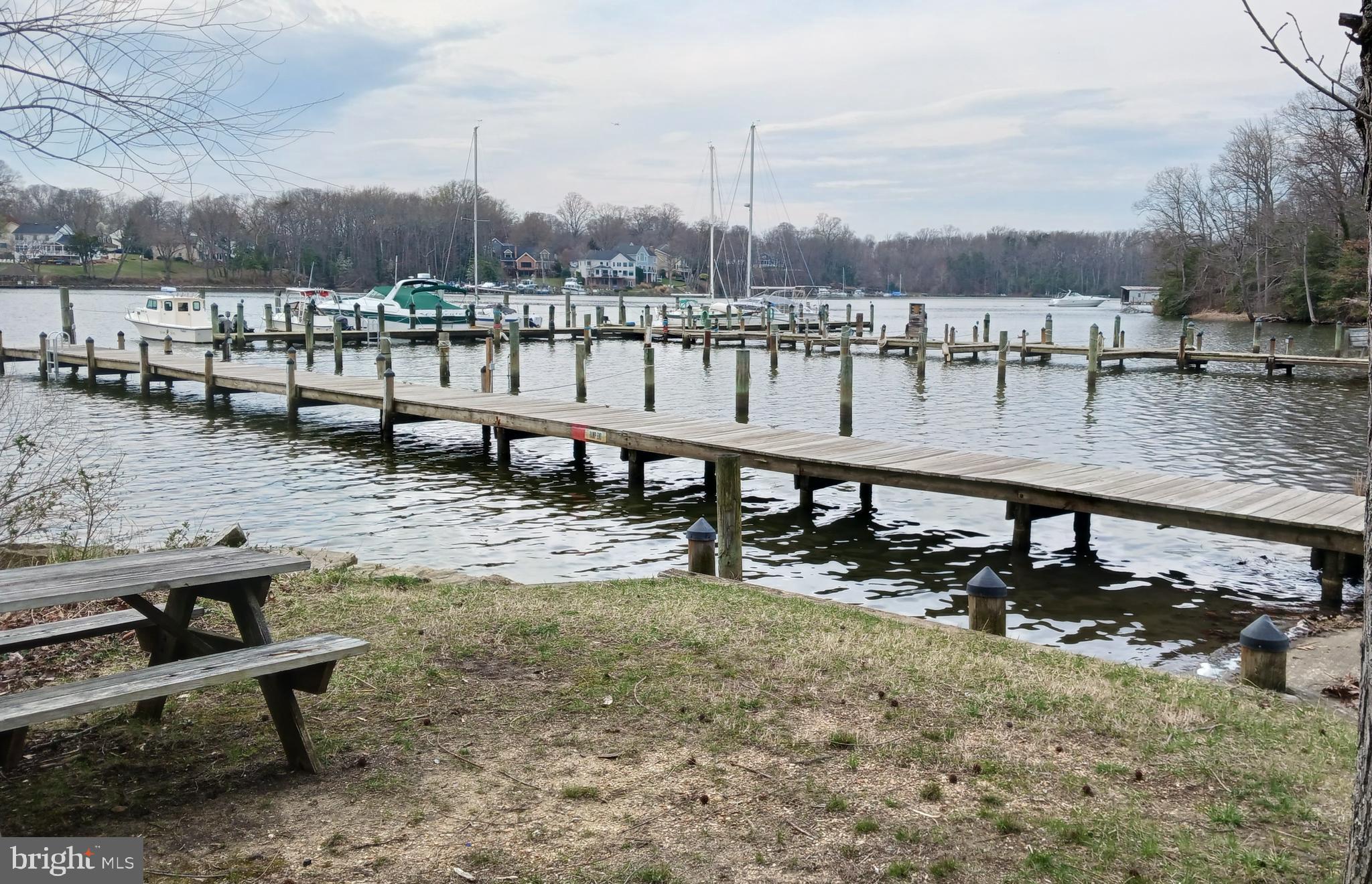 176 Southdown Road Edgewater, MD 21037 - Photo 6 of 13 a view of a lake with sitting area