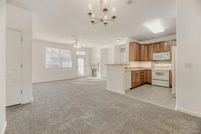 a view of a kitchen with stove cabinets and a kitchen