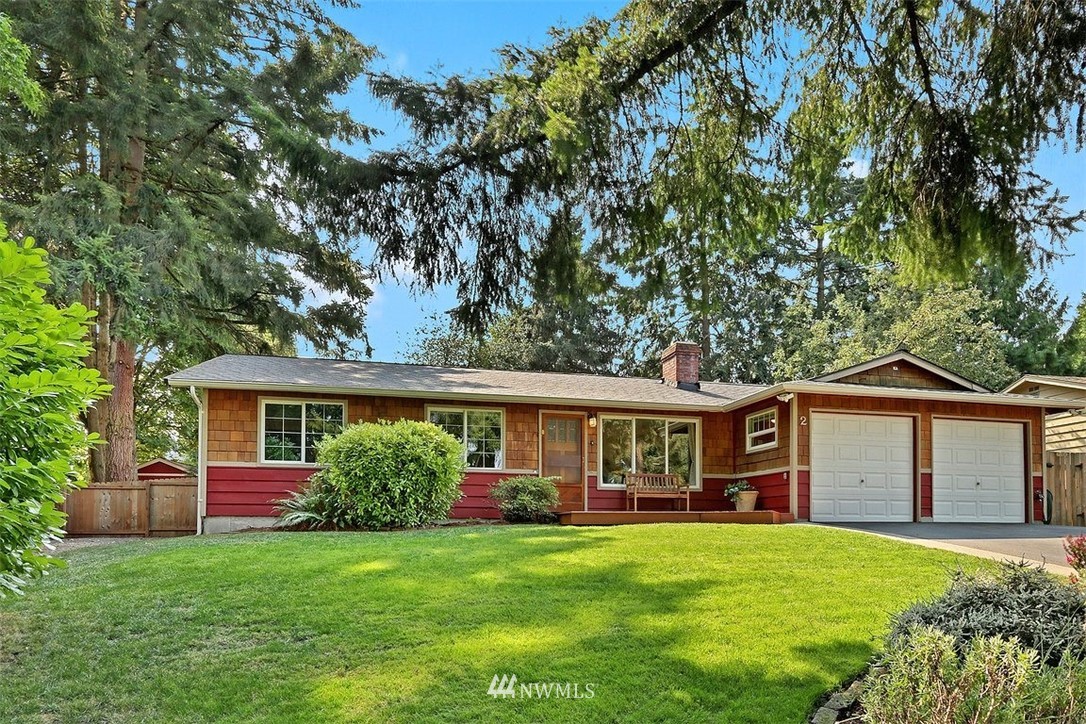 2 222nd Street Southwest Bothell, WA 98021 - Photo 1 of 29 a front view of a house with a garden