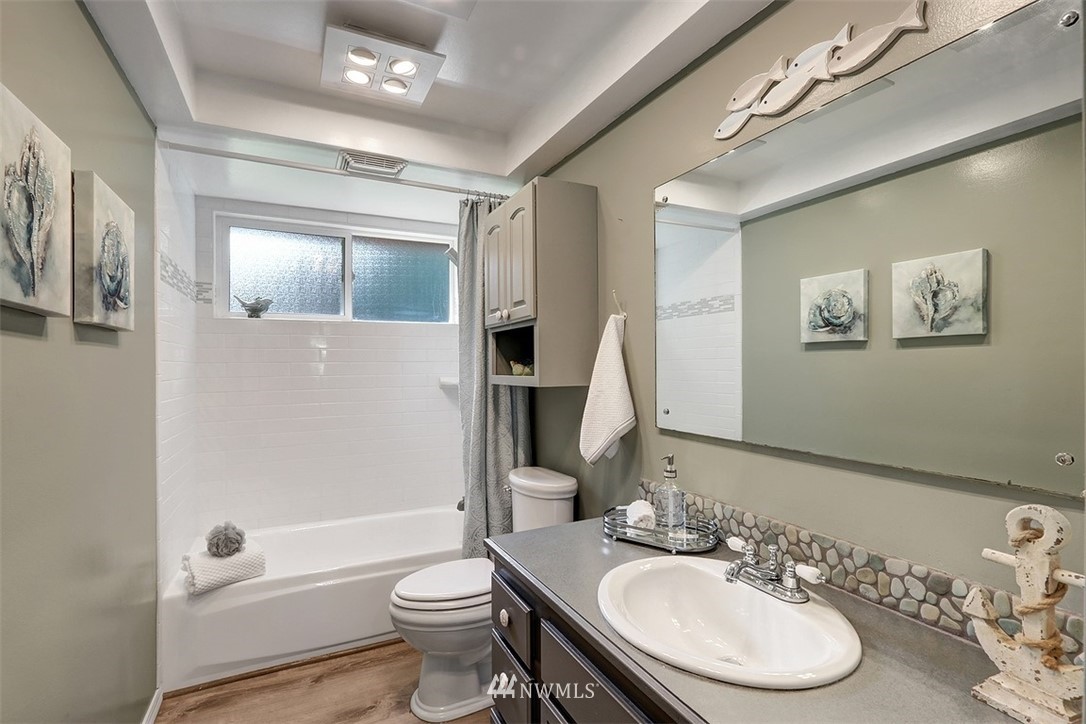 2 222nd Street Southwest Bothell, WA 98021 - Photo 11 of 29 a bathroom with a toilet a sink and a bathtub