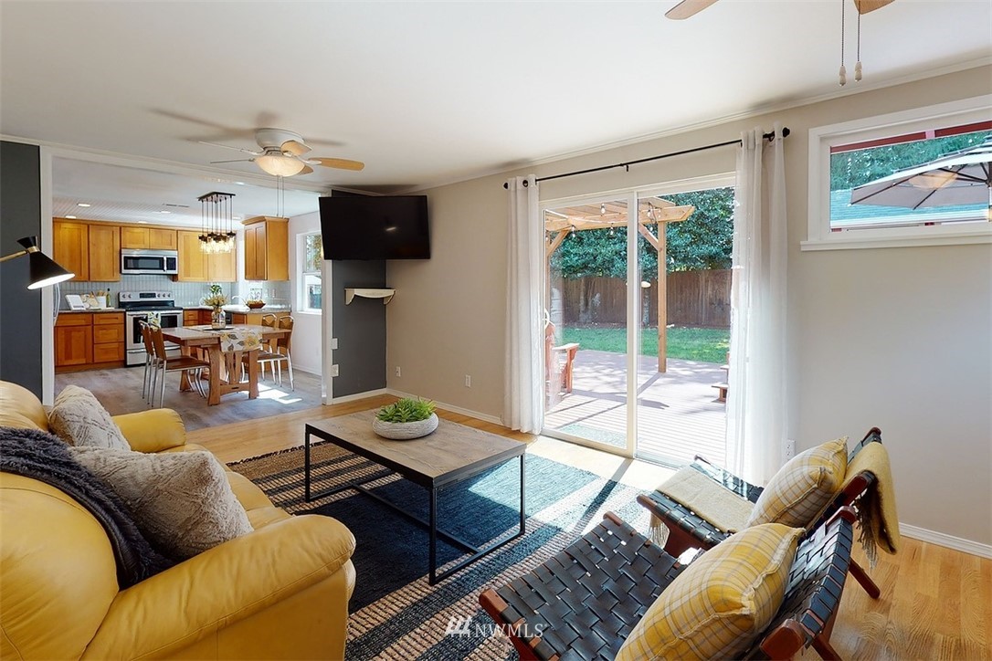 2 222nd Street Southwest Bothell, WA 98021 - Photo 13 of 29 a living room with furniture and a flat screen tv