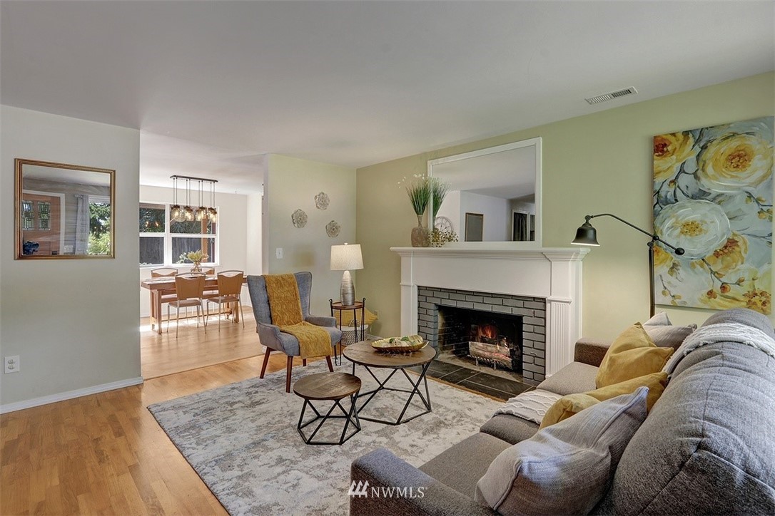 2 222nd Street Southwest Bothell, WA 98021 - Photo 3 of 29 a living room with furniture and a fireplace
